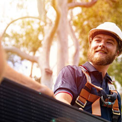 Solar installer with silhouette solar panel.