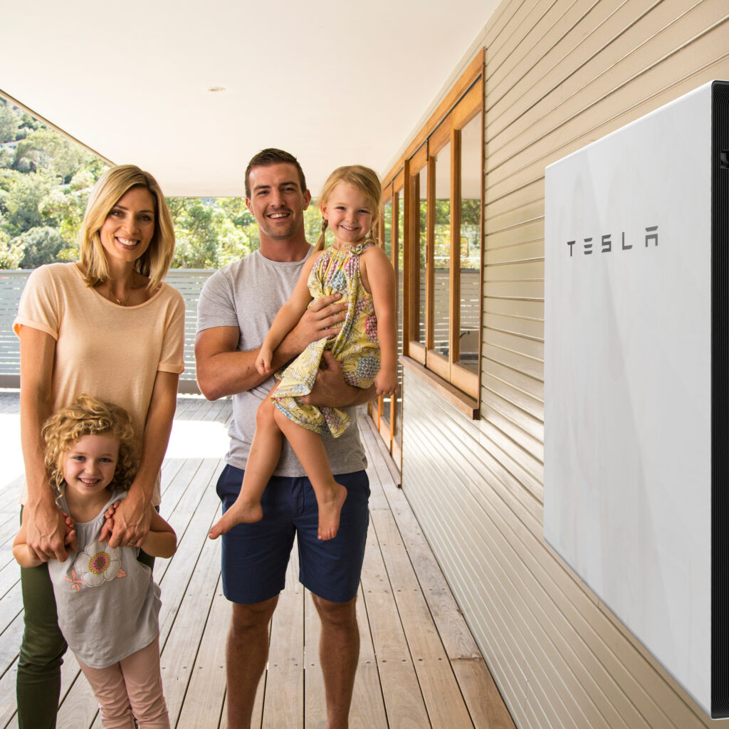 Happy family with Tesla Powerwall 2