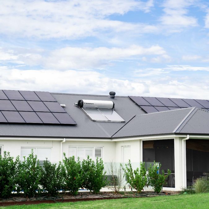 Solahart-Solar-Power-Combo-System-with-Silhouette-Solar-Panels-and-Rooftop-solar-hot-water-system Solahart Solar Power Combo System with Silhouette Solar Panels and Rooftop solar hot water system installed by Solahart Newcastle